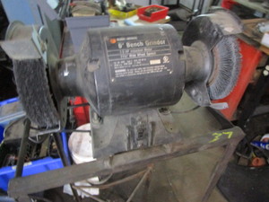 Double wheel grinder on floor stand...