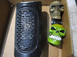 Plug in wall heater - small, skull ...