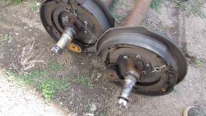 (2) Trailer Axles With Electric Break Backer Plates