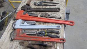 Lot of Pipe wrenches and Pliers