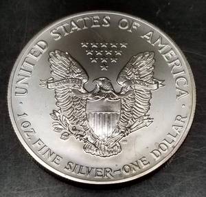 1990 AMERICAN SILVER EAGLE 1 TROY OZ .999 FINE SILVER DOLLAR