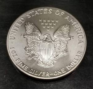 1986 AMERICAN SILVER EAGLE 1 TROY OZ .999 FINE SILVER DOLLAR
