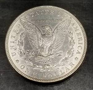 1886 MORGAN SILVER DOLLAR UNC CLEANED