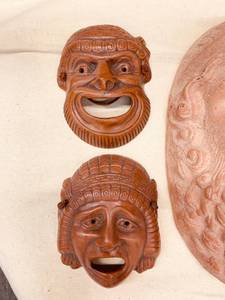 lot 12 image: THREE DECORATIVE TERRA COTTA MASKS