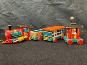 lot 28 image: Vintage 1963 Fisher Price Wooden Huffy Puffy Train #999