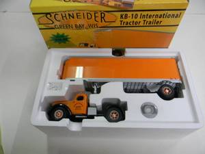 lot 2 image: FIRST GEAR, PRECISELY 134 SCALE DIE CAST - SCHNEIDER GREEN BAY, WIS. KB-10 INTERNATIONAL TRACTOR TRAILER  #18-2944 - NEW IN BOX - GREAT PIECE - SEE PICTURES