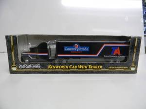 lot 8 image: ERT COLLECTIBLES 164 SCALE DIE CAST - KENWORTH CAB WITH TRAILER COUNTRY PRIDE - NEW IN BOX - GREAT PIECE - SEE PICTURES