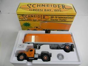 lot 24 image: FIRST GEAR, PRECISELY 134 SCALE DIE CAST - SCHNEIDER GREEN BAY, WIS. KB-10 INTERNATIONAL TRACTOR TRAILER  #18-2944 - NEW IN BOX - GREAT PIECE - SEE PICTURES