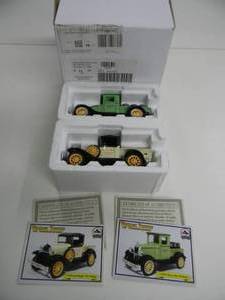 lot 33 image: NATIONAL MOTOR MUSEUM MINT - #VTY2 - 132 SCALE 1928 CHEVY 12 TON PICKUP WBARRELS & 1928 FORD MODEL 76A PICKUP ATLAS CONST - NEW IN BOX - VERY COOL PIECES - SEE PICTURES