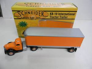 lot 48 image: FIRST GEAR, PRECISELY 134 SCALE DIE CAST - SCHNEIDER GREEN BAY, WIS. KB-10 INTERNATIONAL TRACTOR TRAILER  #18-2944 - NEW IN BOX - GREAT PIECE - SEE PICTURES