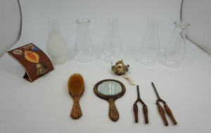 lot 110 image: Vintage curling irons, hurricane lamp shades etc.
