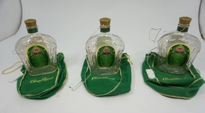 lot 121 image: 3) Crown Royal Bottles with FireFly Lights and PouchesGreat Crown Royal Lovers Gift