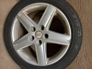 SET OF (4) AUDI RIMS AND TIRES