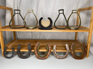 lot 65 image: 12 Horseshoes and Stirrups