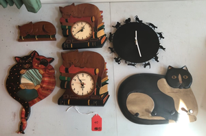 lot 40 image: 19 Cat Wall Hangings and Pillows Clocks