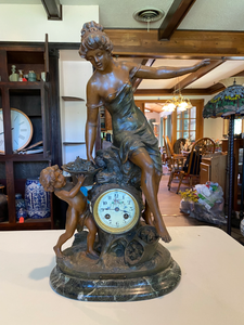lot 35 image: French Figural Clock Premieres Fleurs Par Math. Moreau.