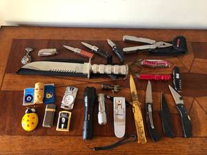 lot 587 image: Pocket Lot - knives, lighters, flashlights, etc.
