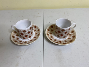 lot 696 image: Pair of Cups and Saucers