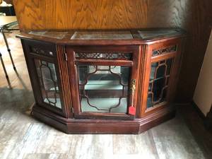 lot 140 image: Trapezoidal Wood and Glass Lighted Display Cabinet
