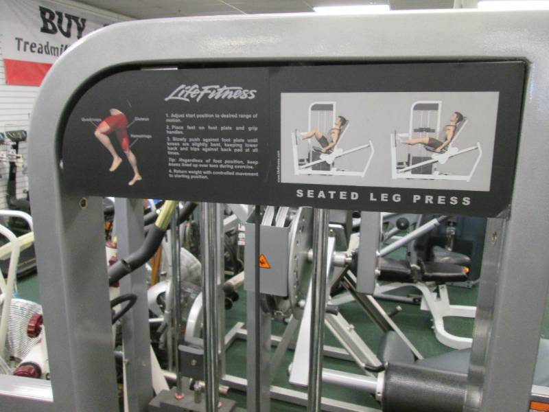 lot 01 image: Life Fitness seated leg press...