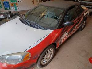 2004 Chrysler Sebring Touring Convertible with Parade Top. Only 74,119 Miles, 2.7L V-6, DOHC 24 Valve, Automatic, Very Clean.