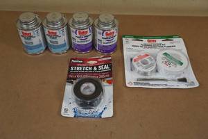 lot 115 image: Plumbing Solder Kit, Purple Primer, Medium Blue PVC Cement and Tape