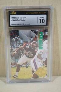 lot 42 image: 1993 Classic Four Sport Michael Strahan #146 Rookie Football Card - CSG 10