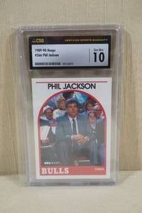 lot 71 image: 1989-90 NBA Hoops Phil Jackson #266 Rookie Basketball Coach Card - CSG 10