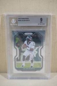lot 151 image: 2020 Panini Prizm Jalen Hurts #343A Rookie Football Card - Beckett 9