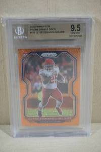 lot 154 image: 2020 Panini Prizm Clyde Edwards-Helaire Orange Disco Rookie Card - Beckett 9.5