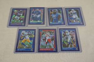 lot 171 image: 2021 Optic Football Purple Shock Refractor Rookie Cards