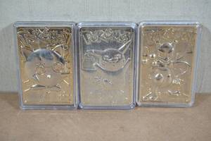lot 204 image: Vintage Gold Plated Metal Pokemon Cards - Jigglypuff, Pikachu, Mewtwo