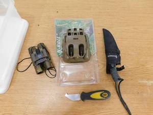 lot 151 image: Simmons Binoculars 288ft 1000yds , Gerber Knife, Rack & Roll