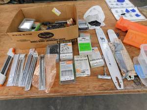 lot 157 image: Huge Lot of Stihl Chain Saw parts and Tools