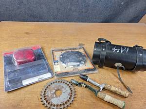 lot 1051 image: Harley Davidson Parts, Handlebar OUTLAWS Bag w Signature and More