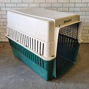 lot 1071 image: Remington large Dog Kennel - Overall about 36 x 29 x 26 - NO SHIPPING