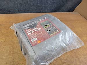 lot 1076 image: New in package 20 x 30 Extreme Duty Tarp - 10mil