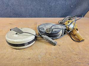 lot 1079 image: Retractable Extension Cord and Retractable Trouble Light