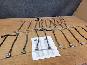 lot 1098 image: Set of Radial Chain Tire Chains - Model SC1026 - Each is about 52 x 13