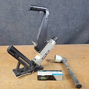 lot 1119 image: Porter Cable Pneumatic Hardwood Flooring Cleat Nailer - Model No. FCN200 and Mallet
