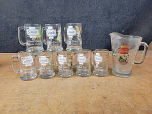 lot 1133 image: Complete Set of Glass Schmidt Beer Mugs Wildlife Collector Series #1 thru #8  Pitcher