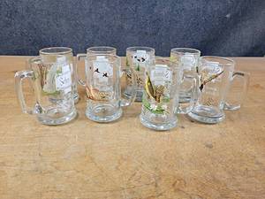 lot 1135 image: Complete Set of Glass Schmidt Beer Mugs Wildlife Collector Series #1 thru #8