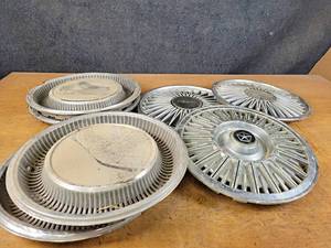 lot 1168 image: Oldsmobile and Chrysler Hub Caps