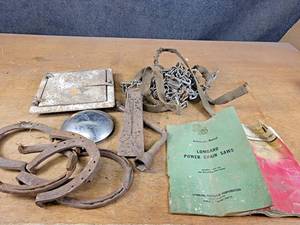 lot 1169 image: Antique Horseshoes, Splitting Wedge, Cast Iron Door and More