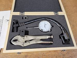 lot 1286 image: CEN-TECH Dial Indicator with Flex Stand and Clamp in Case - Part No. 93051