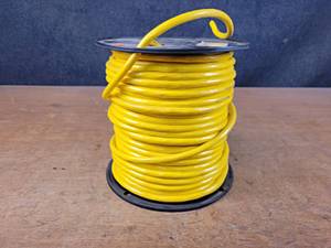 lot 1315 image: Spool of 123 300V Insulated Copper Wire - Spool is about 10-12 Diameter x 10-12 Tall