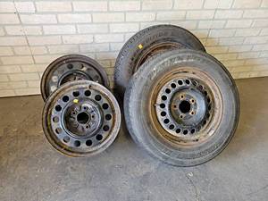 lot 1336 image: (4) Steel 15 Trailer Rims - 5 x 4.25 - 2 have tires - NO SHIPPING