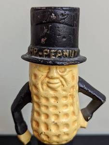 lot 68 image: Mr. Peanut Cast Iron Bank
