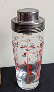 lot 84 image: Vintage Cocktail Shaker and Jim Beam Bottle