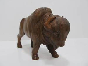 lot 41 image: Hand Carved Solid Wood Buffalo Sculpture